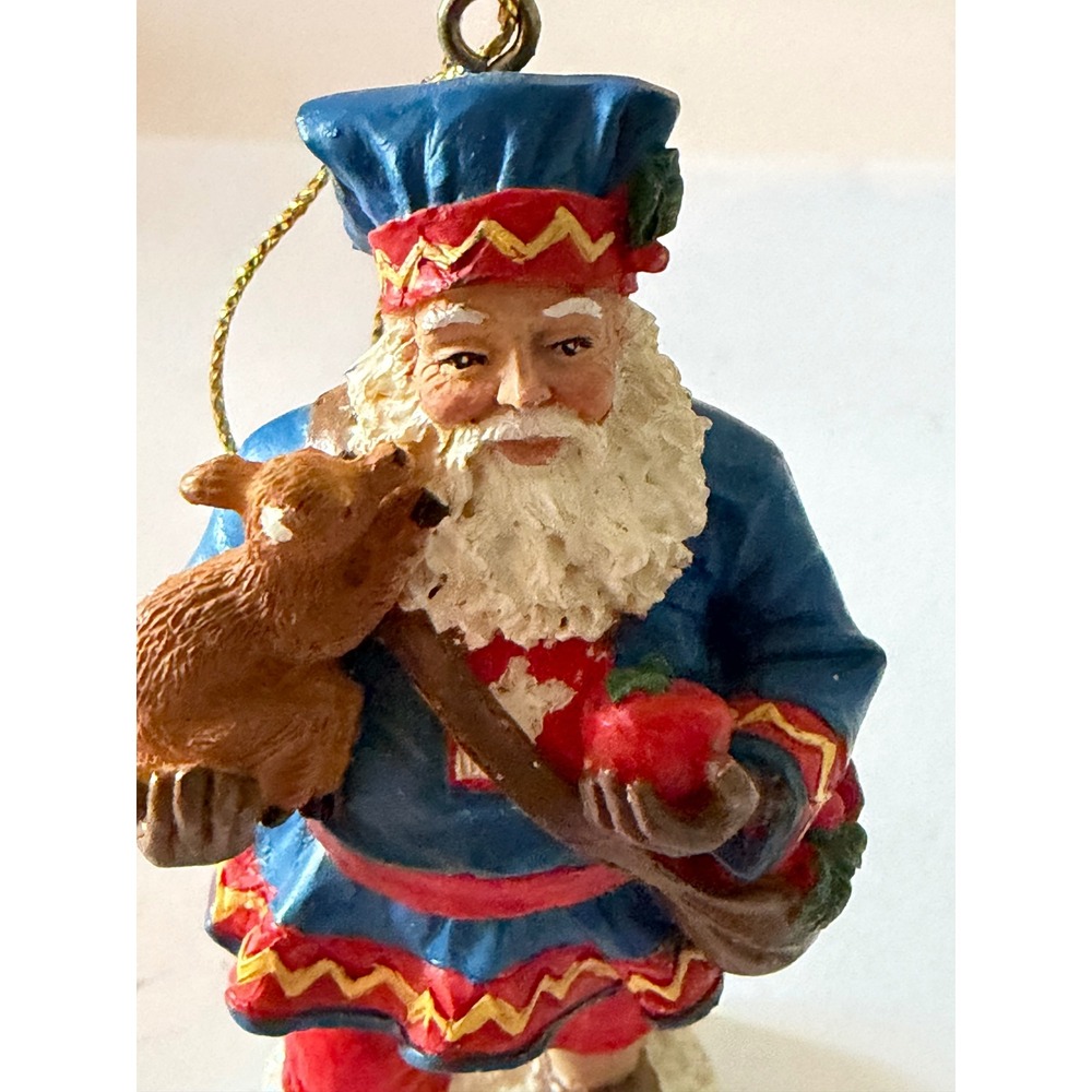 The Internationalβ Santa Claus baby reindeer ornament